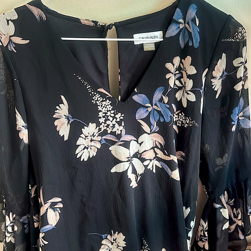 Black dress with flowers.